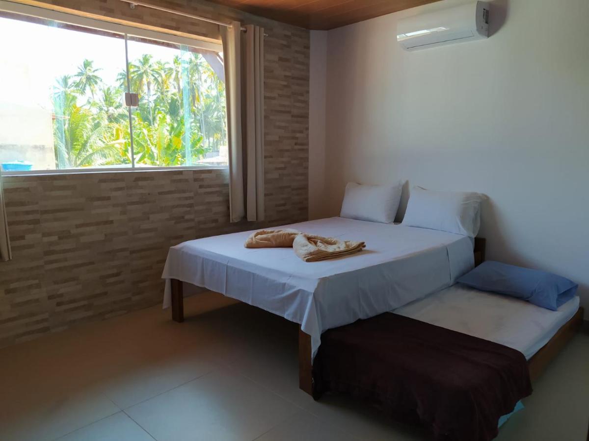Quarto Deluxe (2 Adultos + 1 Criança)