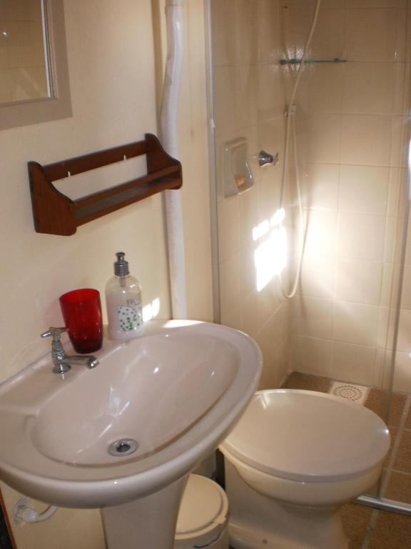 Quarto Individual Clássico com Varanda