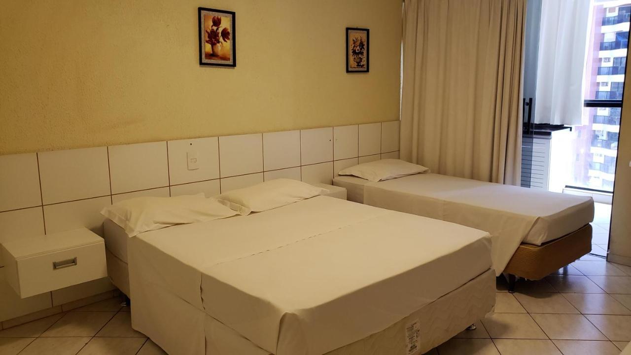 Quarto Triplo com Vista para a Piscina