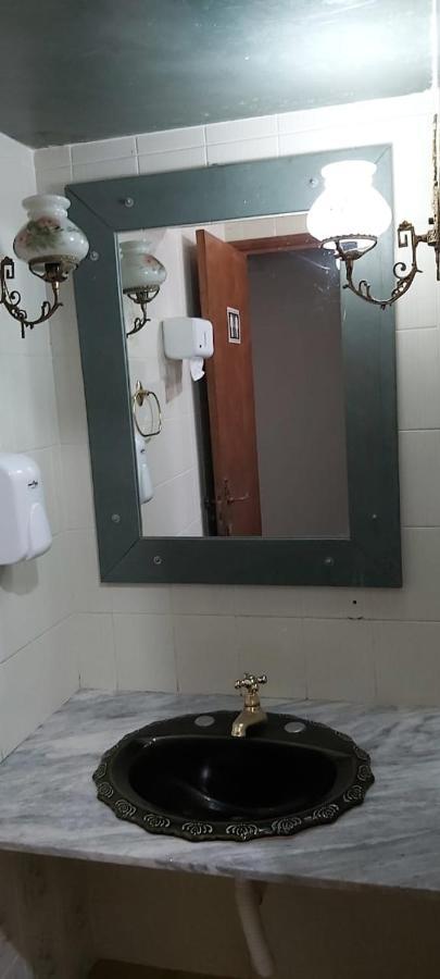 Quarto Quádruplo com Banheiro Compartilhado