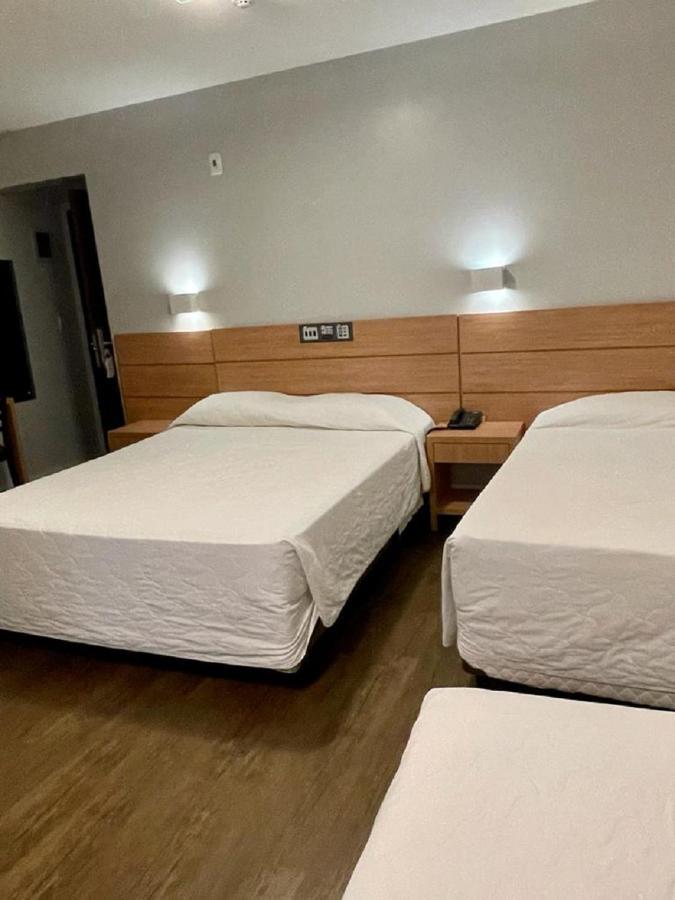 Quarto Quádruplo com Varanda