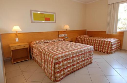 Quarto Triplo com Banheira