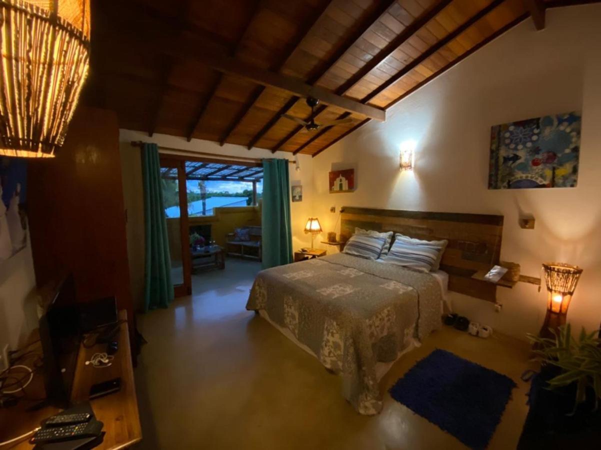 Quarto Deluxe com Varanda e Vista da Piscina e do Jardim
