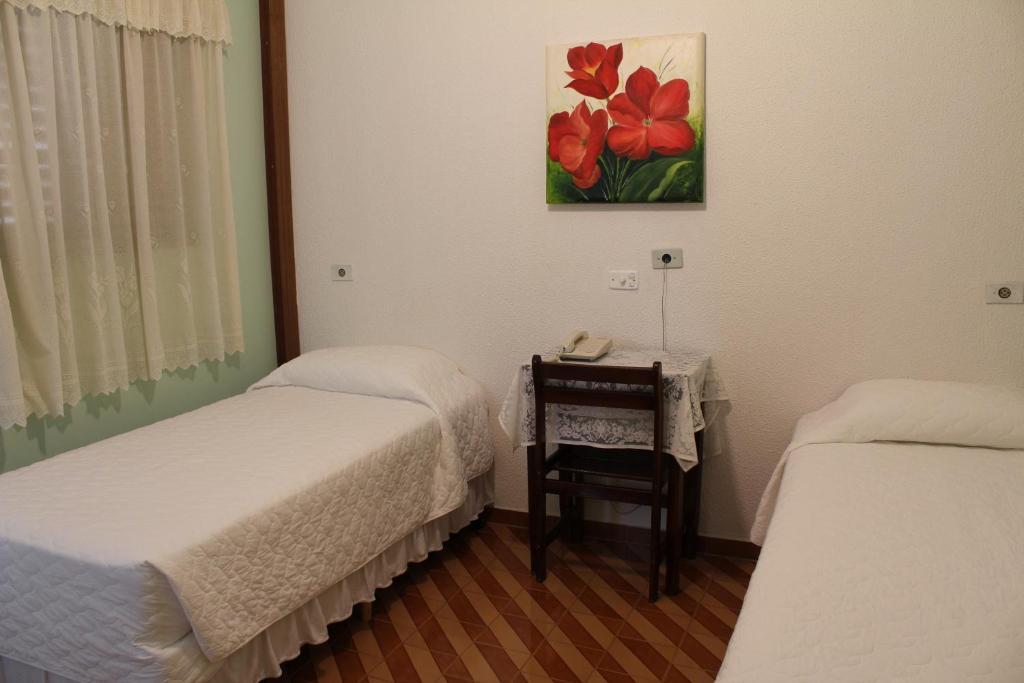 Quarto com Cama de Casal ou 2 de Solteiro e Ar-condicionado