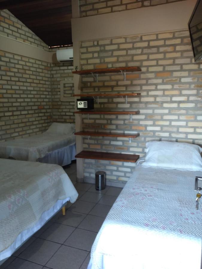 Quarto Quádruplo com Vista para o Mar