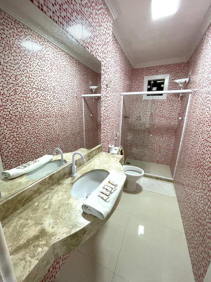 Quarto Quádruplo Premium