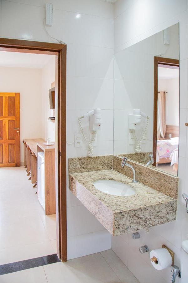 Quarto Triplo com Vista para a Piscina