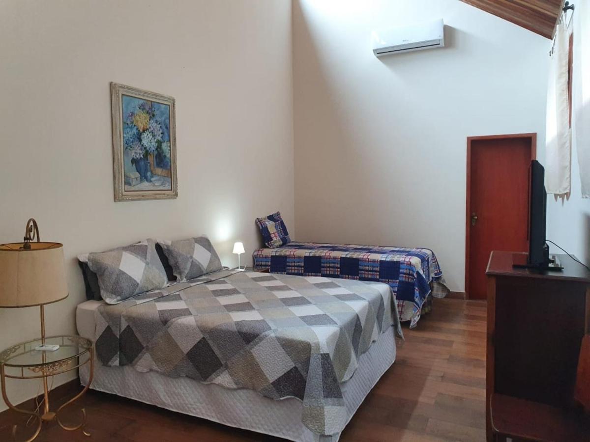 Quarto Quádruplo Premium