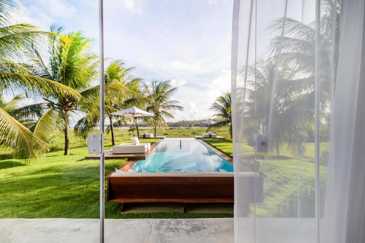 Quarto com Cama King-size e Vista do Mar