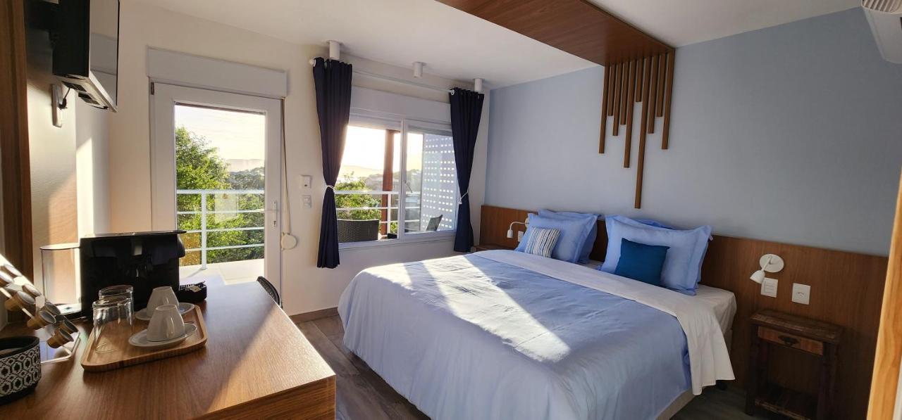 Quarto Deluxe com Cama de Casal ou 2 de Solteiro e Vista do Mar