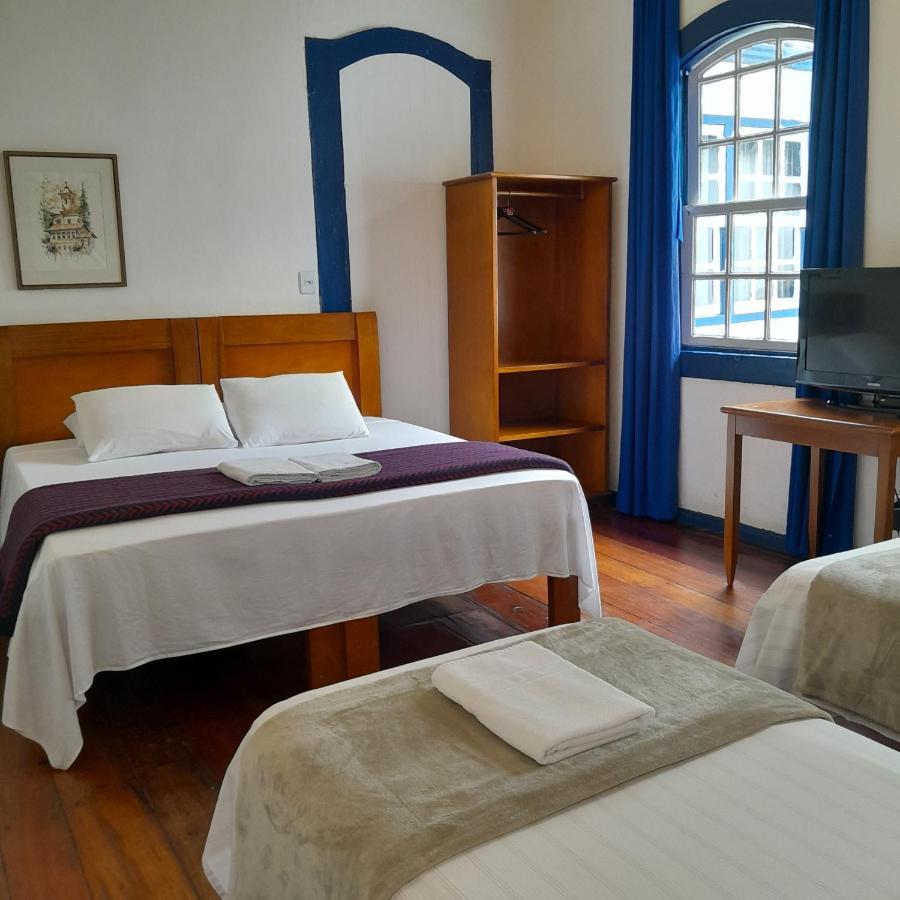 Suíte Deluxe com janela para o pátio,1332810365:JPEG