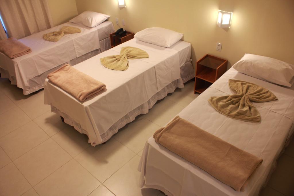 Quarto Triplo com Varanda