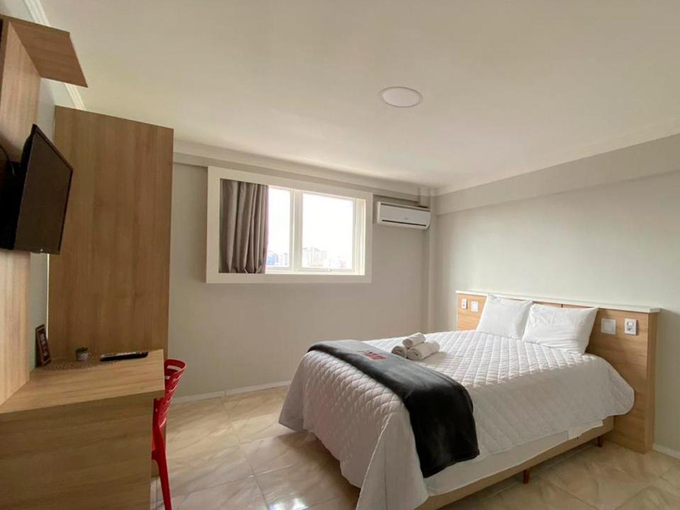 Quarto Duplo (1 Adulto + 1 Criança)