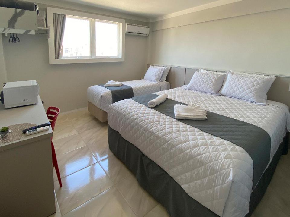 Quarto Duplo