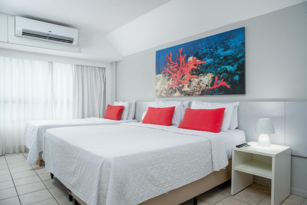 Quarto Triplo com Vista Parcial do Mar (3 Adultos + 1 Criança)
