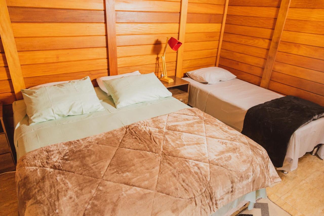 Quarto Triplo com Varanda