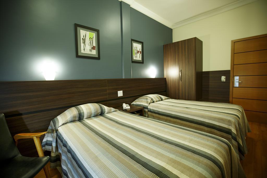 Quarto Deluxe com Cama de Casal ou 2 de Solteiro