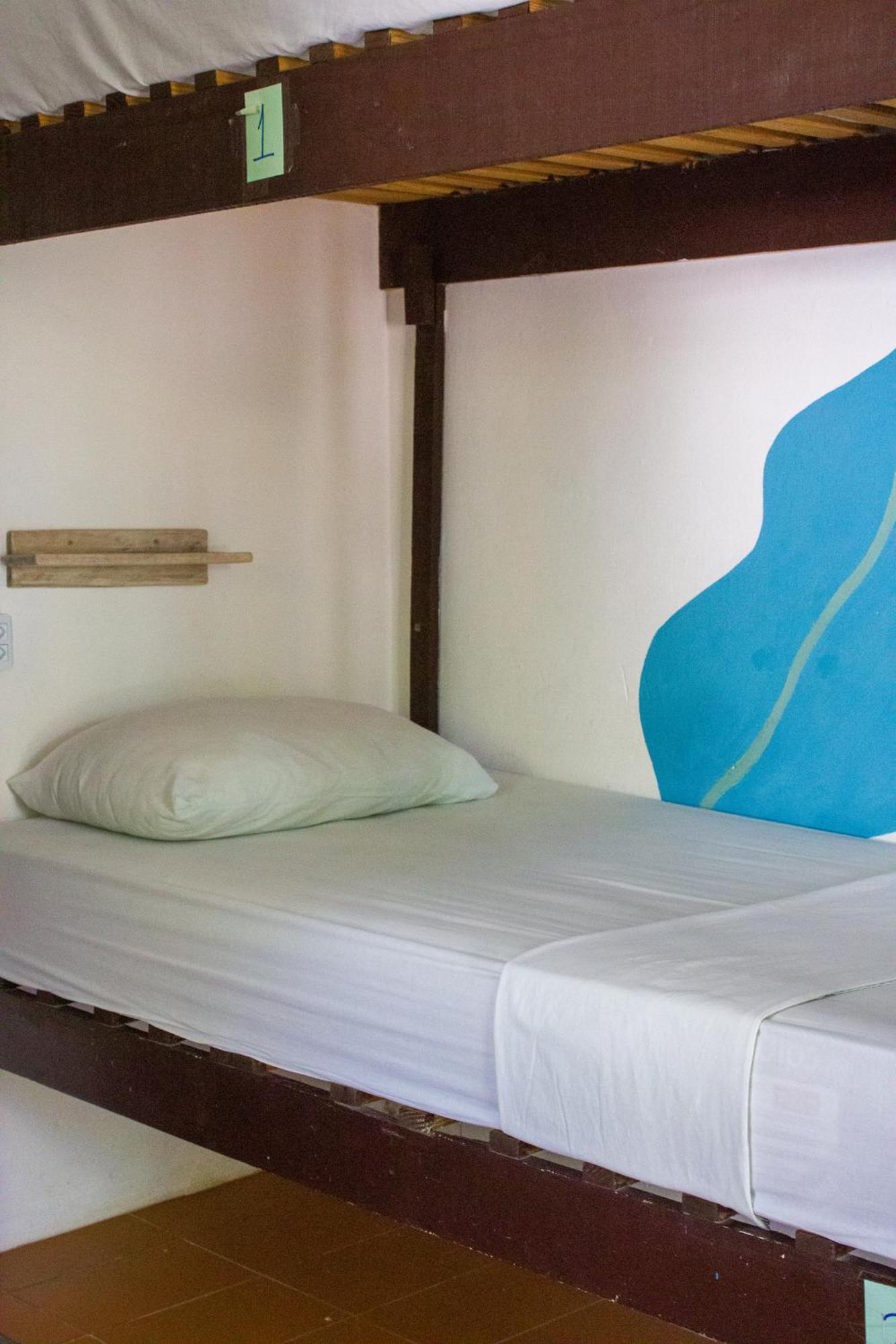 Cama em Dormitório Misto com 8 Camas