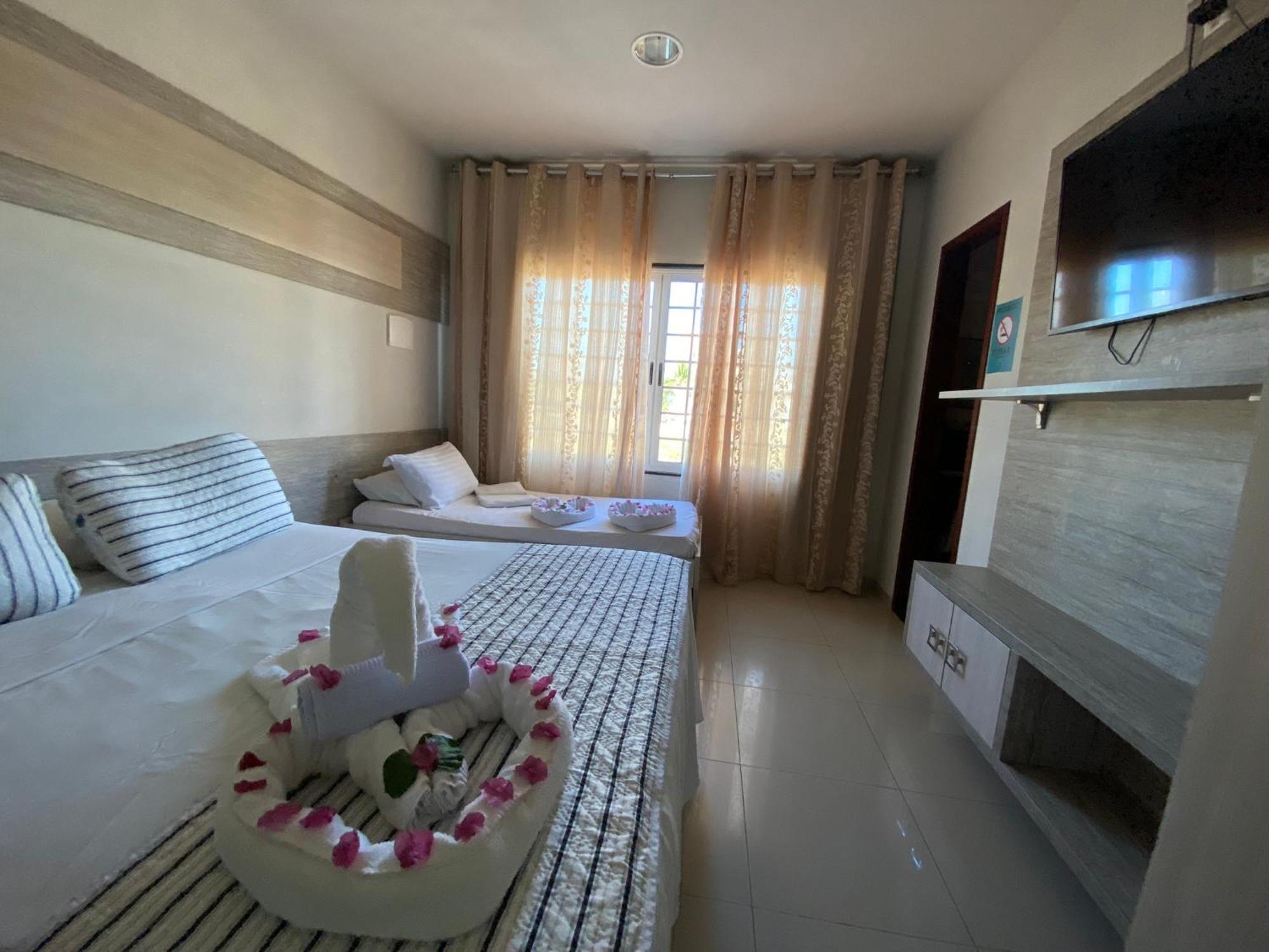 Quarto Quádruplo Premium