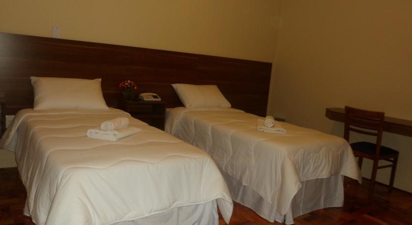 Quarto Triplo com Varanda