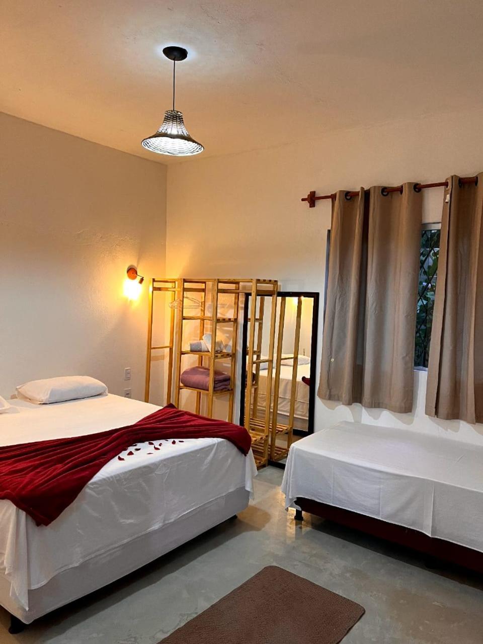 Quarto Deluxe (2 Adultos + 1 Criança)