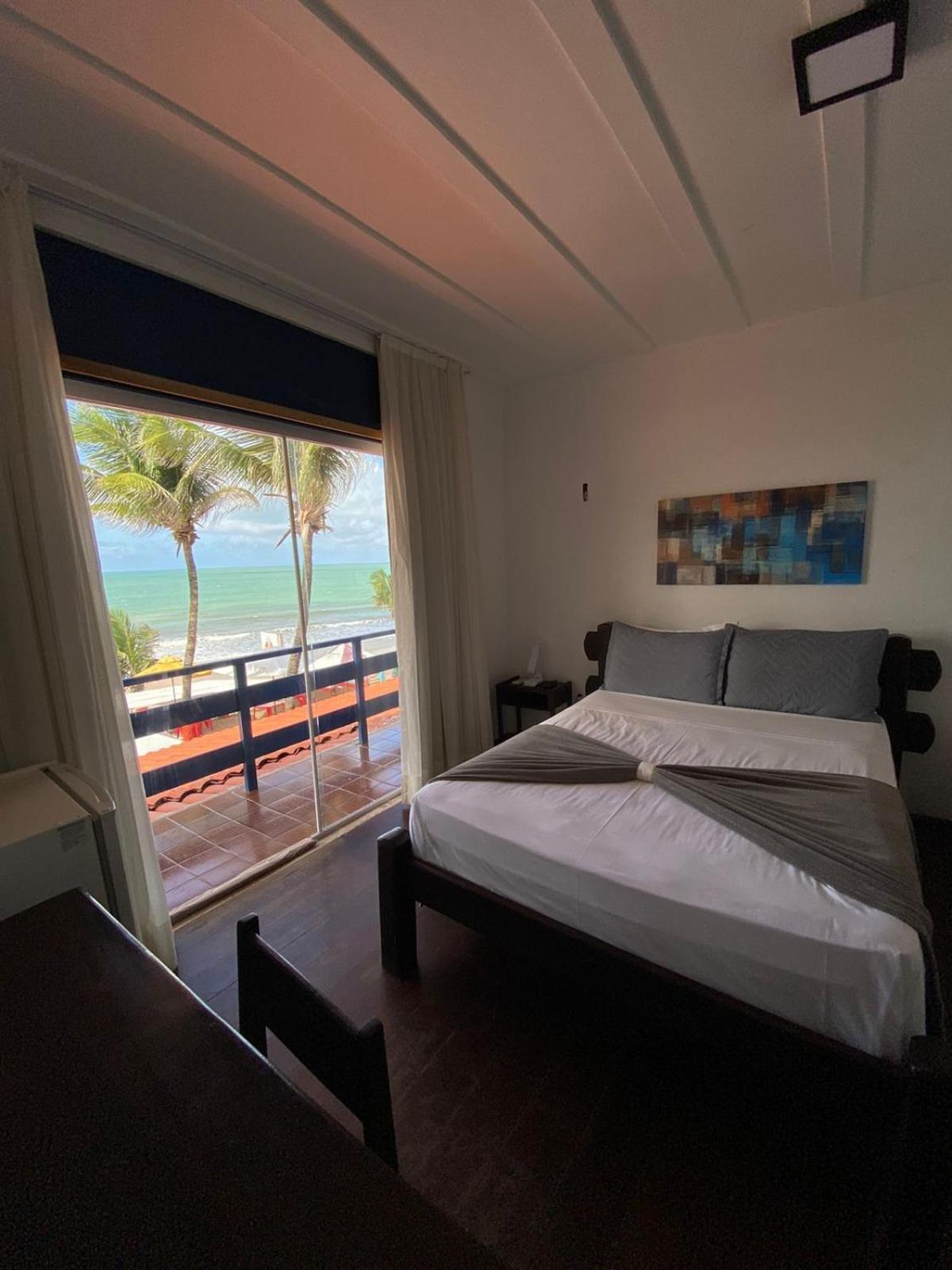 Quarto Triplo Deluxe com Vista do Mar