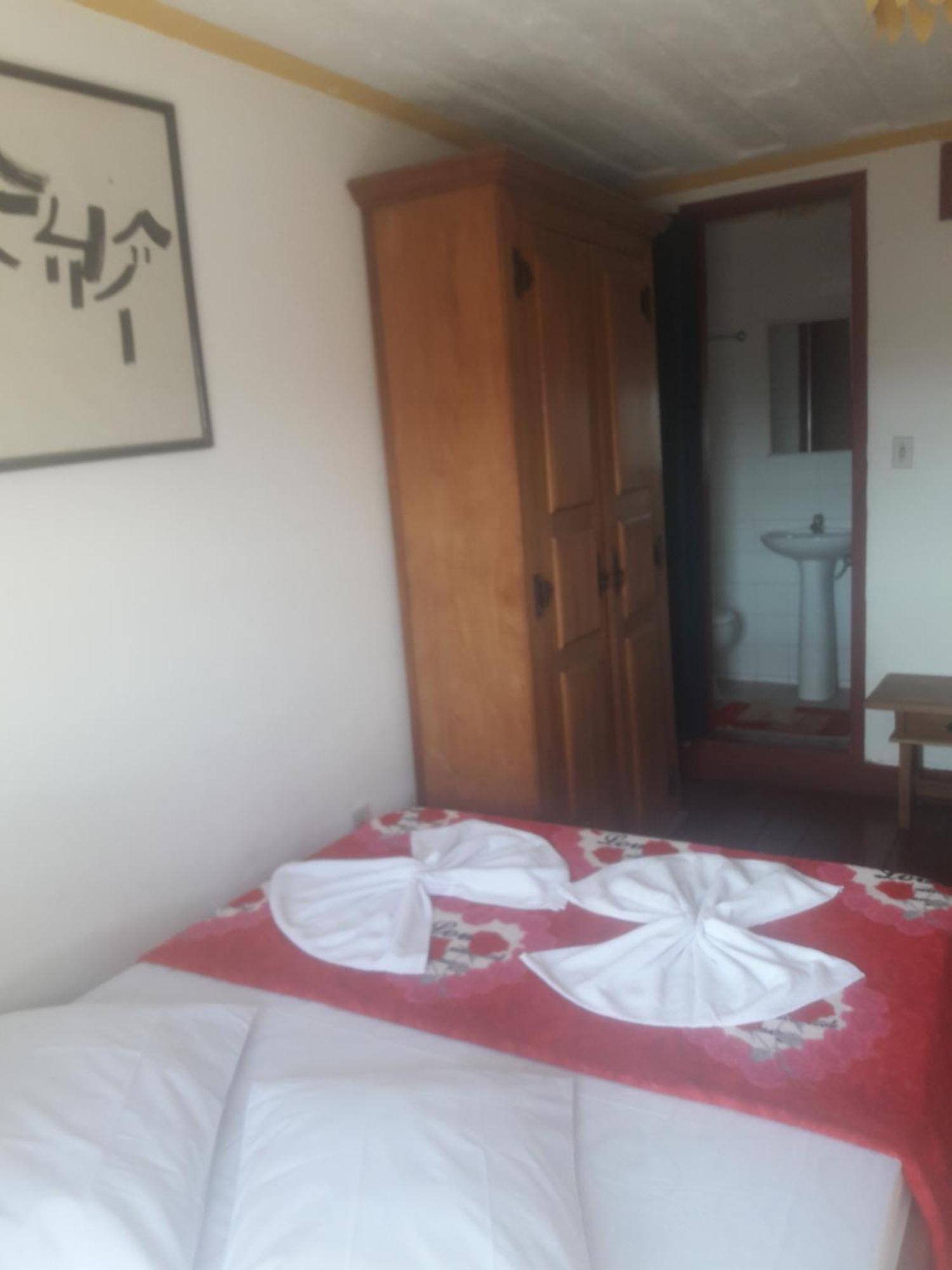 Quarto Triplo com Vista da Cidade