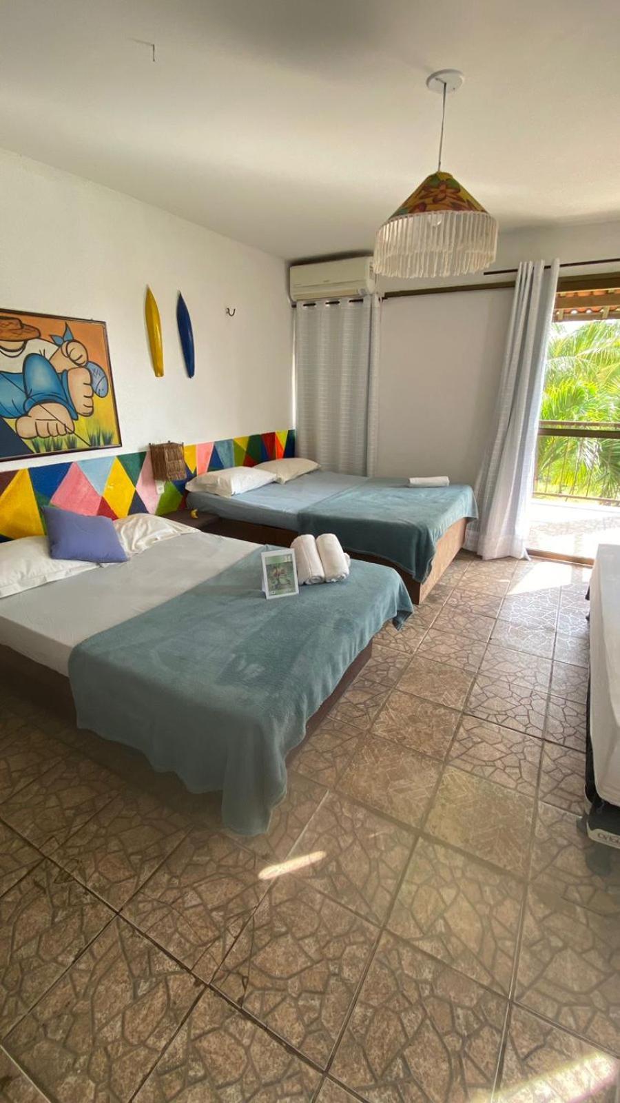 Quarto Triplo com Varanda