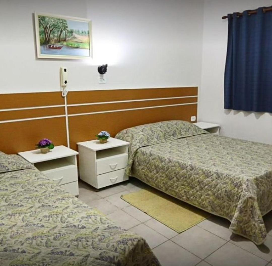 Quarto Triplo com Ar-condicionado