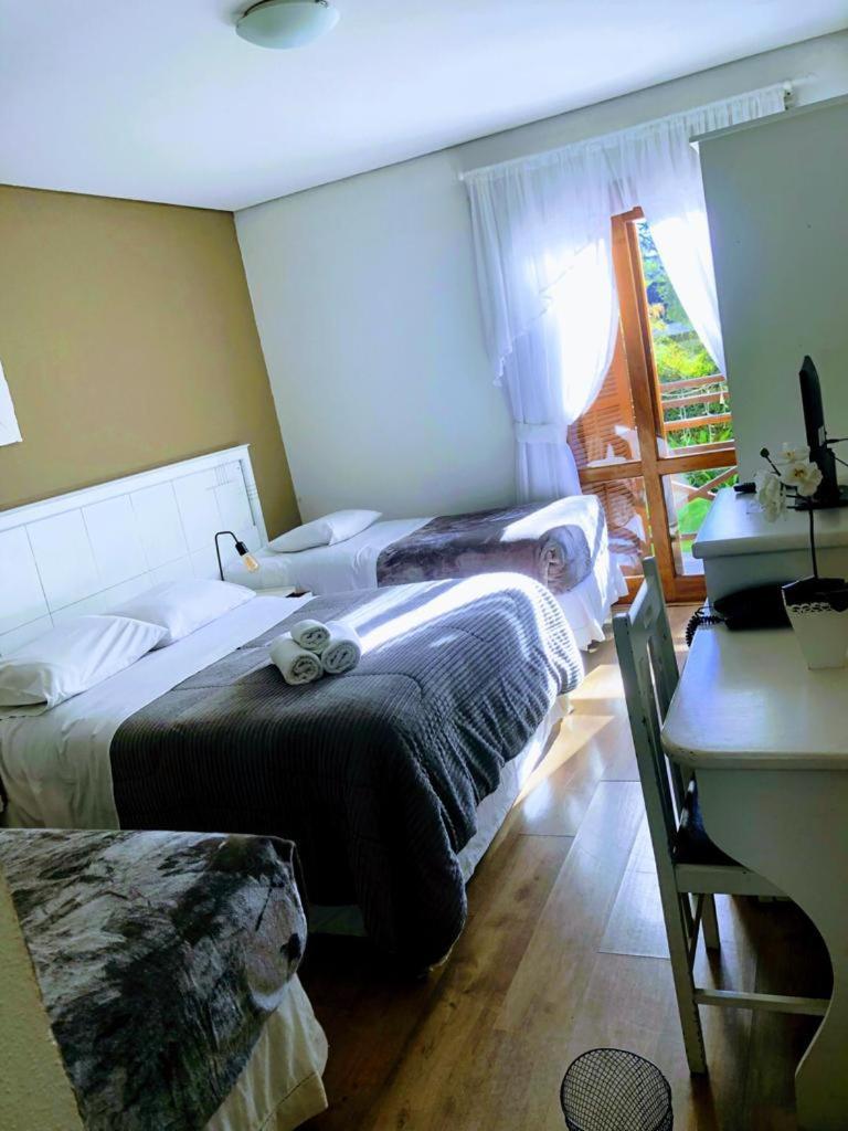 Quarto Quádruplo com Vista do Jardim