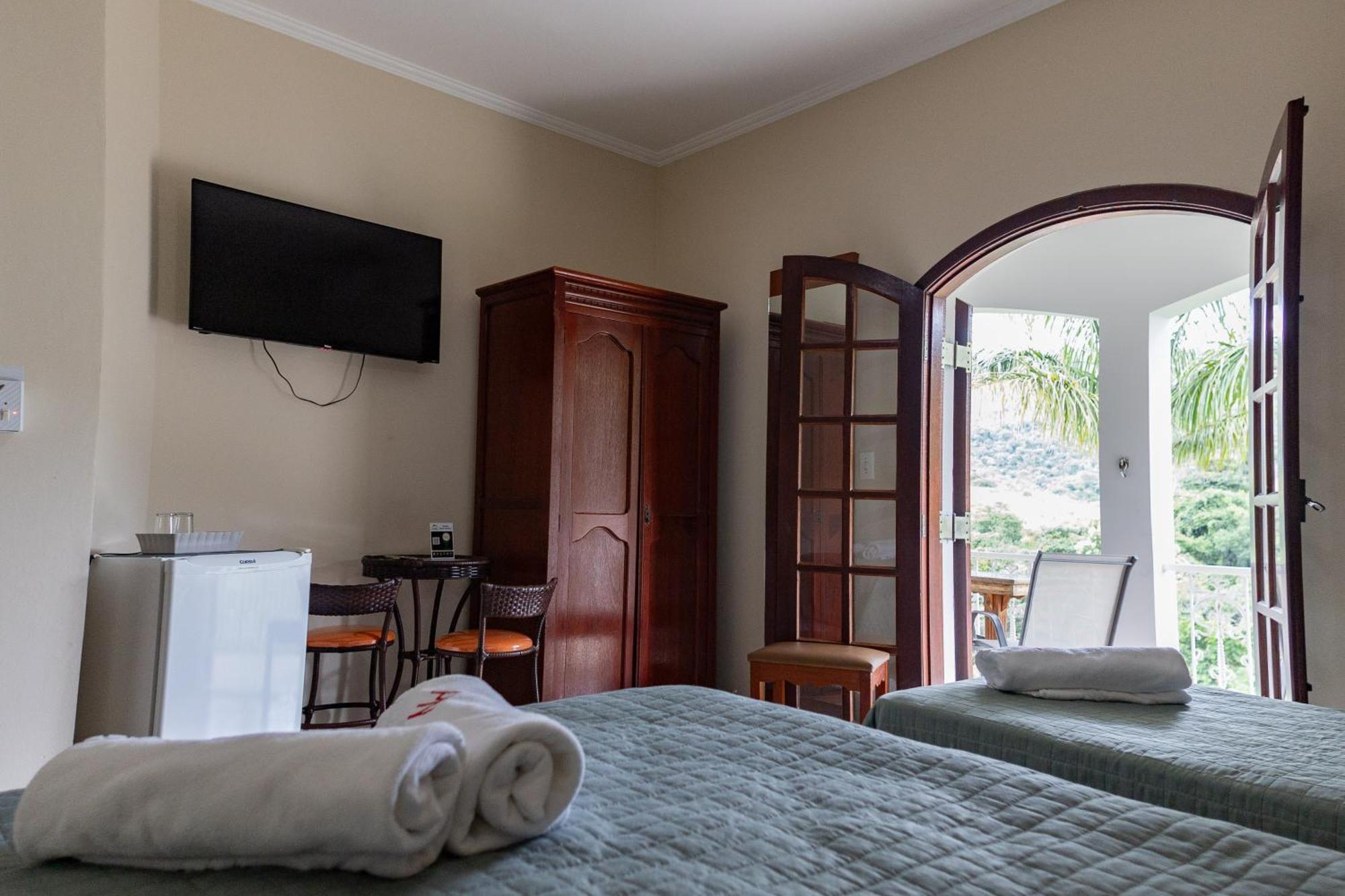 Quarto Triplo com Varanda