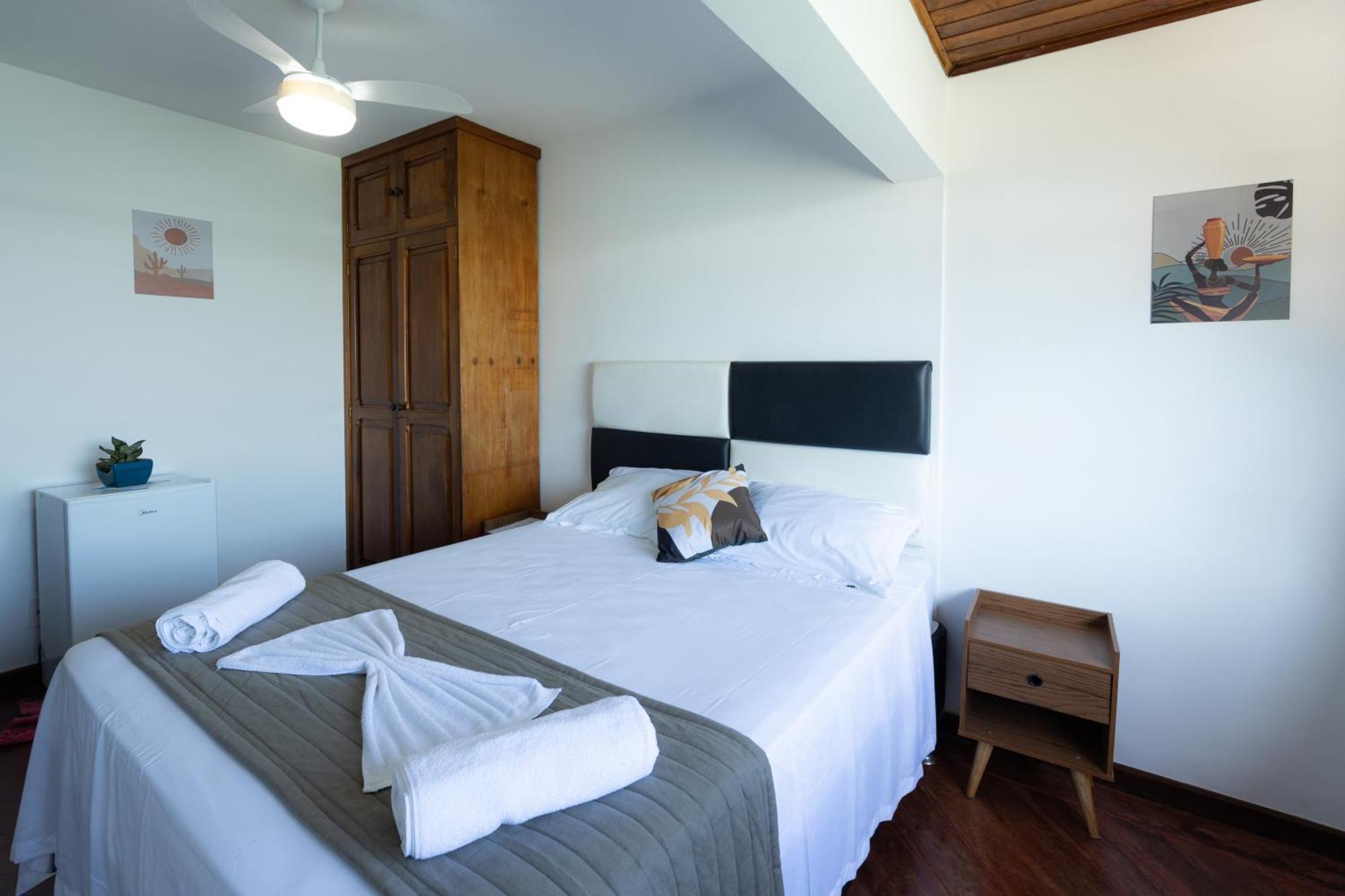Kamer met Queensize Bed en Uitzicht op Zee