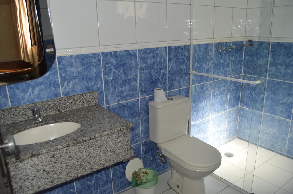Quarto Triplo com Ar Condicionado (3 Camas Individuais)