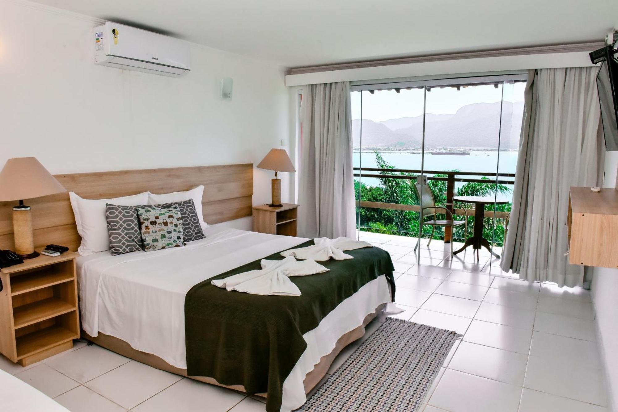 Suíte com Varanda e Vista para o Mar