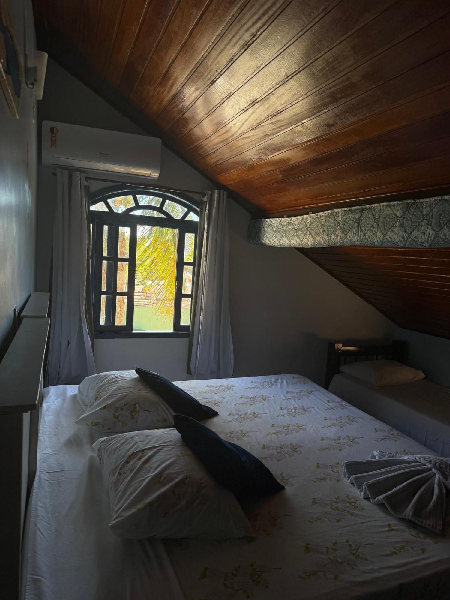 Quarto Quádruplo com Banheiro Compartilhado