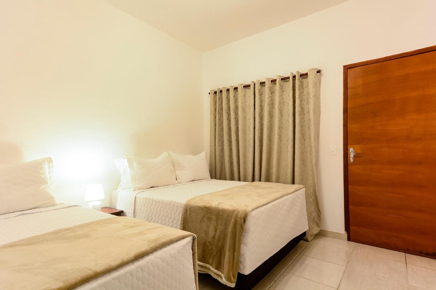 Quarto Triplo com Vista para a Piscina