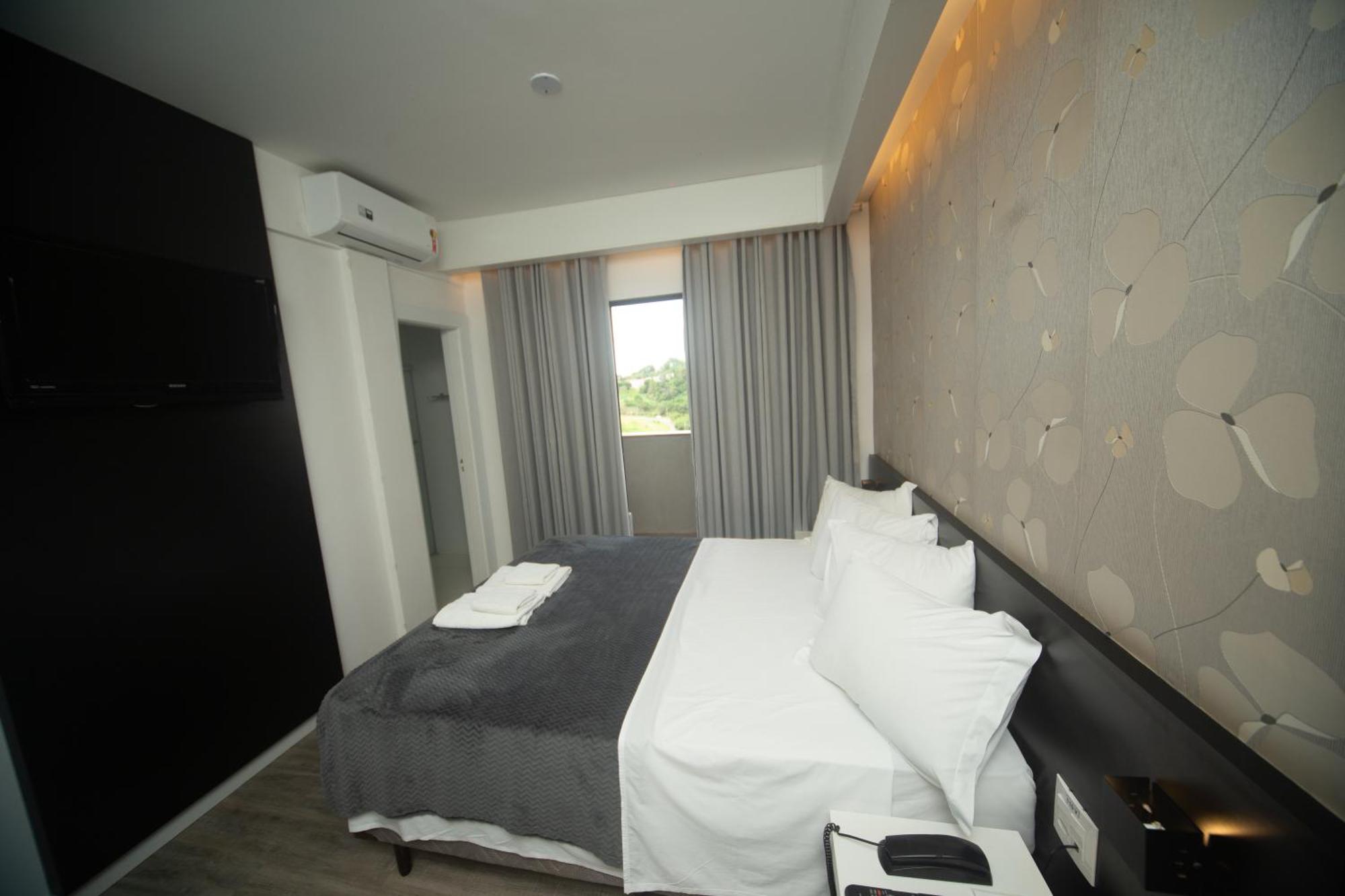 Quarto Superior com Cama Queen-size