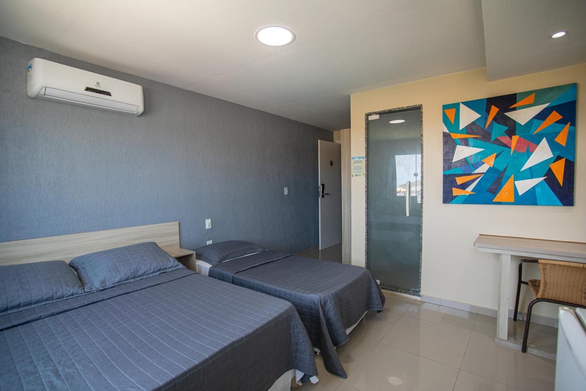 Quarto Quádruplo com Vista do Mar.