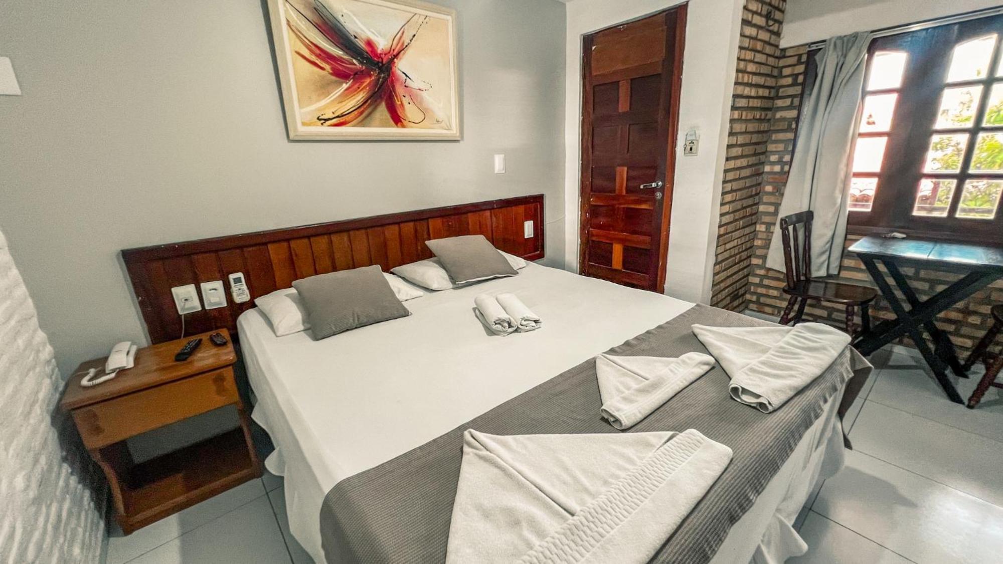 Quarto Deluxe com Cama de Casal ou 2 de Solteiro