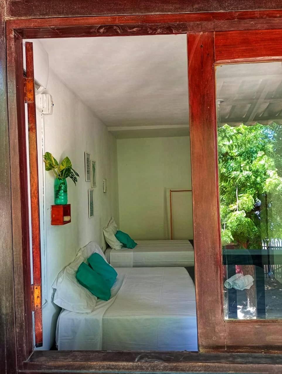 Quarto Triplo com Varanda