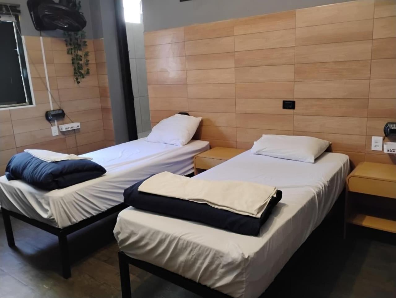 Cama Individual en habitación compartida femenina