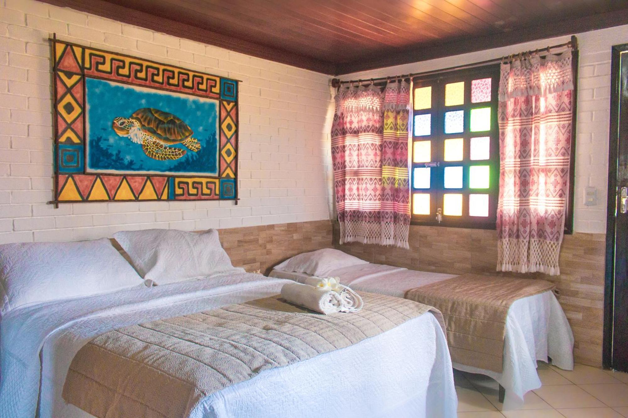 Quarto Duplo Deluxe (2 Adultos + 1 Criança)