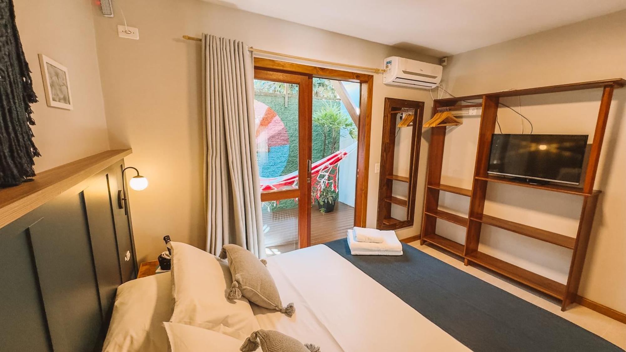 Quarto Família com Varanda