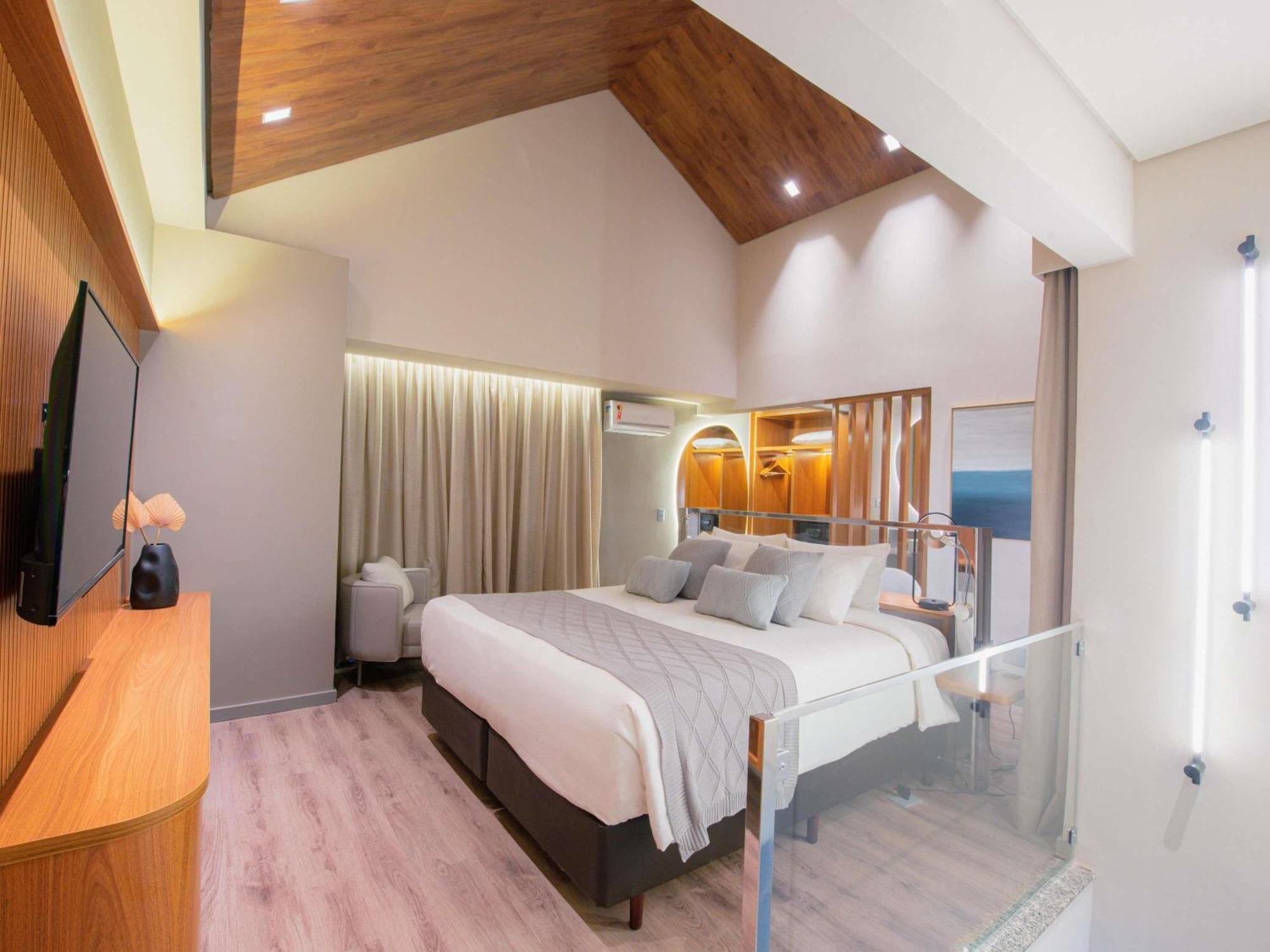 Superior King Suite with One King and Two Twin or Two King Beds