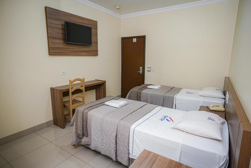 Quarto com 2 Camas de Solteiro