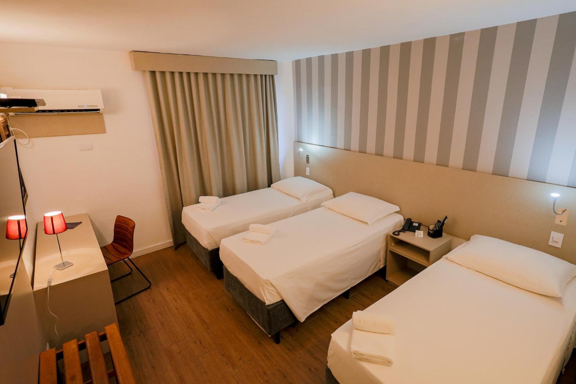 Quarto Triplo com Vista da Cidade