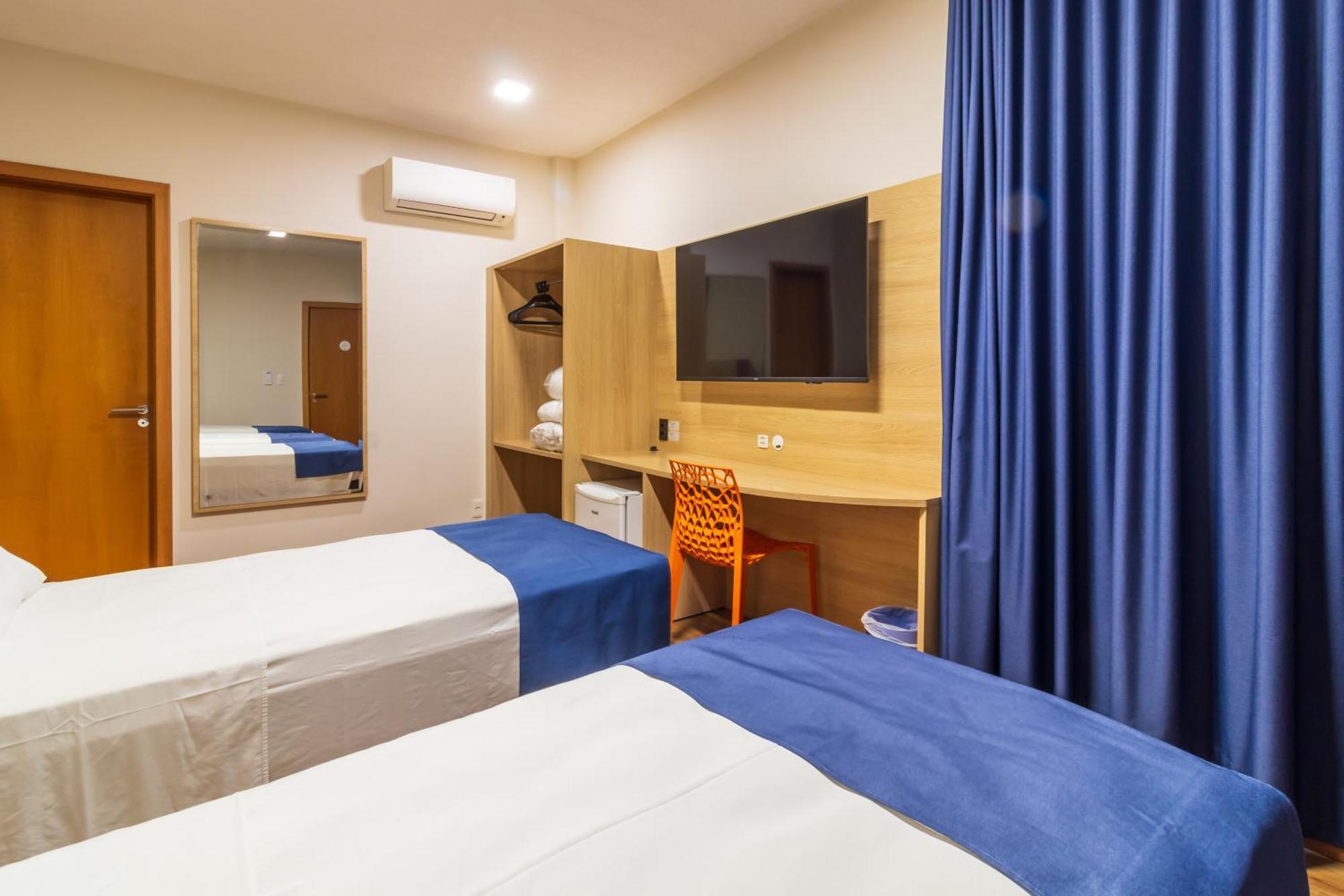 Quarto Triplo com Varanda