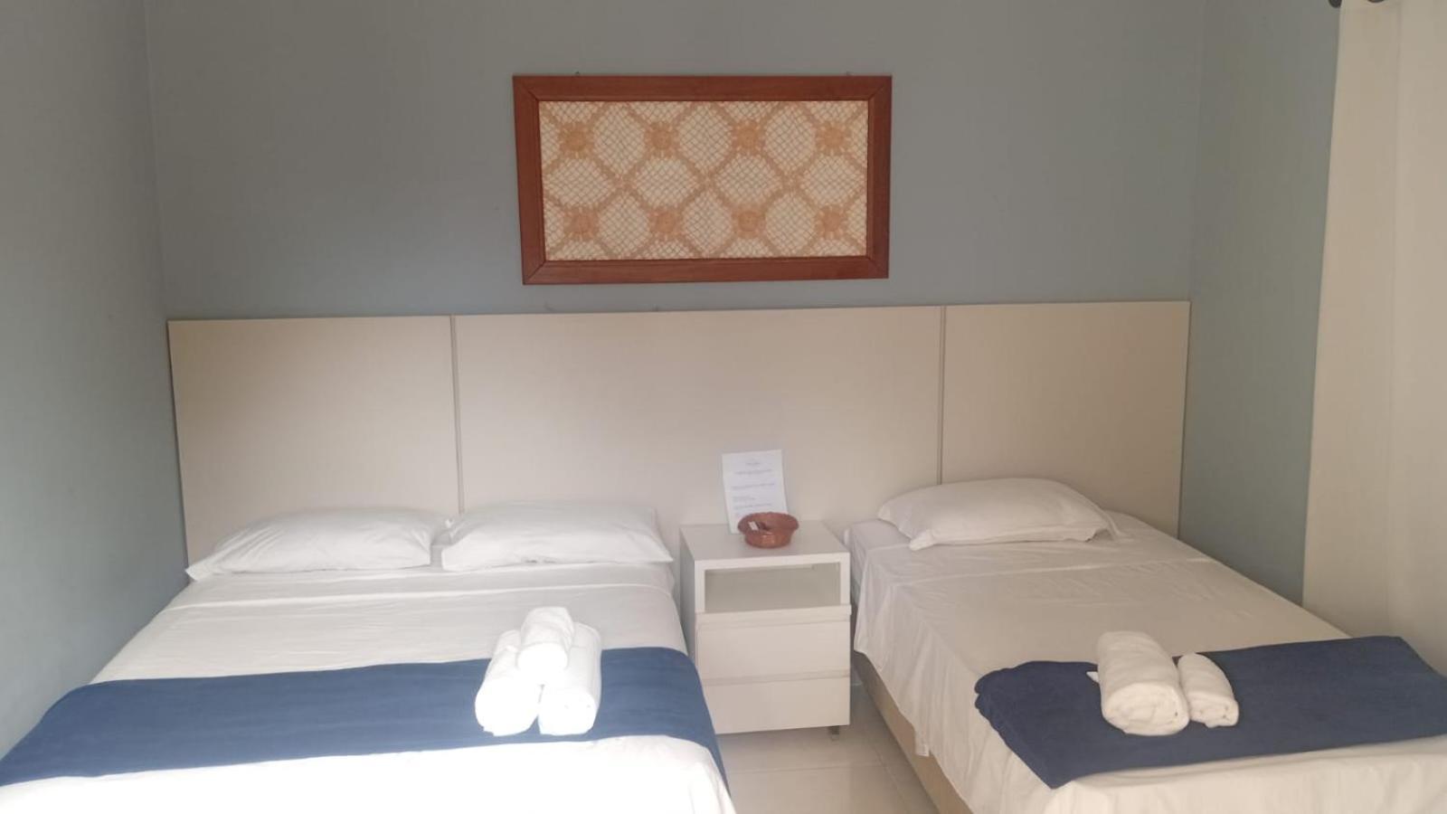 Quarto Triplo com Banheiro Privativo