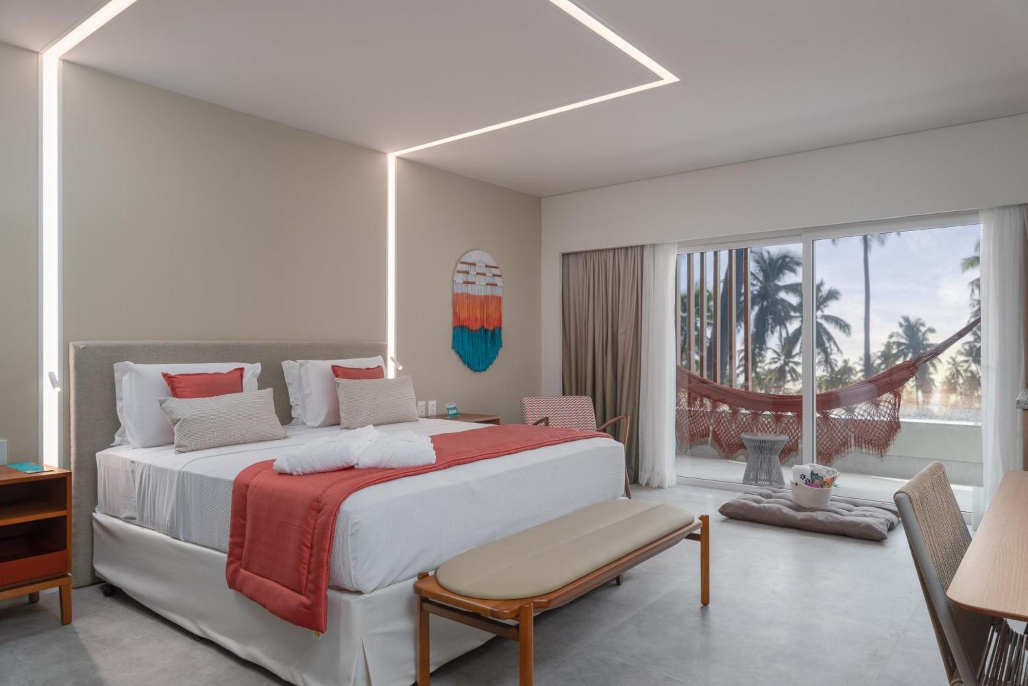 Quarto exclusivo com vista do jardim