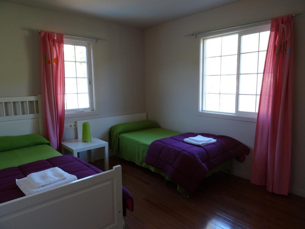 Quarto Quádruplo com Varanda